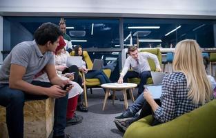 Multiethnic startup business team having meeting photo