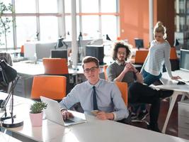 businessman working using a laptop in startup office photo