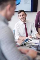 young business people group on meeting at modern office photo