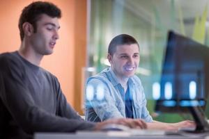 technology students group working  in computer lab school  classroom photo