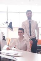 portrait of business couple at office photo