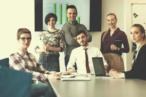 portrait of business people group at modern office meeting room photo