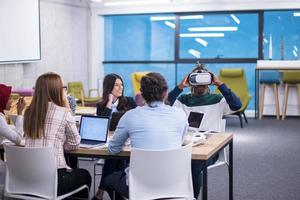 Young Multiethnic Business team using virtual reality headset photo