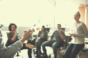 Young Business Team At A Meeting at modern office building photo