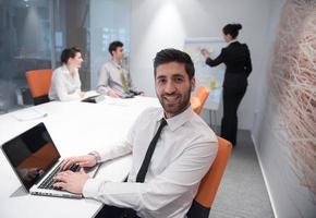 young business man at meeting photo