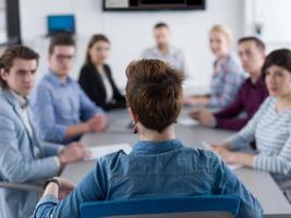 Business Team At A Meeting at modern office building photo