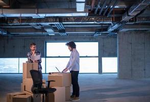 business people in group, architect and engineer on construction site photo