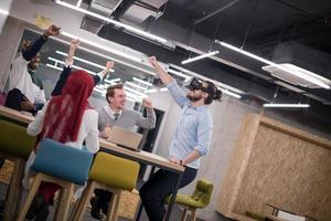 Young Multiethnic Business team using virtual reality headset photo