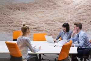 Business Team At A Meeting at modern office building photo