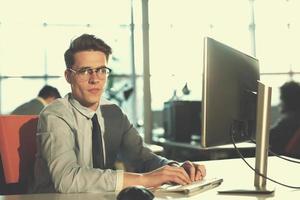 businessman working using a computer in startup office photo