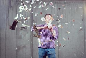 businessman making the rain of money photo