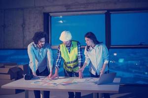 business people in group, architect and engineer on construction site photo