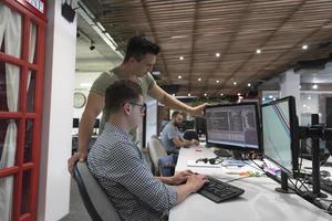 startup business people group working as team to find solution photo