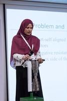 Muslim businesswoman giving presentations photo