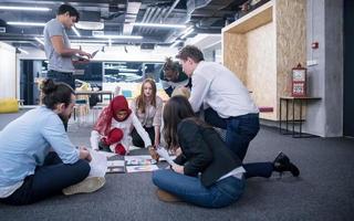 black muslim woman having meeting with Multiethnic  startup business team photo