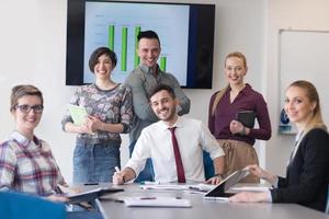 portrait of business people group at modern office meeting room photo