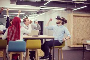 Young Multiethnic Business team using virtual reality headset photo