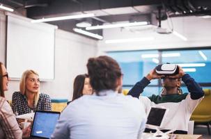 Young Multiethnic Business team using virtual reality headset photo