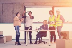 group of multiethnic business people on construction site photo