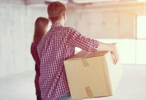 business team carrying cardboard boxes photo