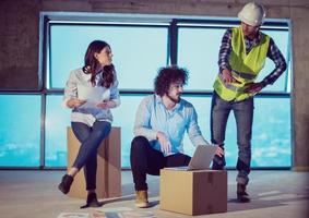 business people in group, architect and engineer on construction site photo