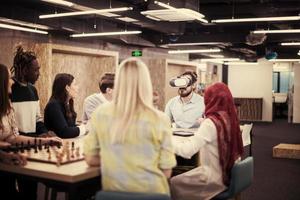 Young Multiethnic Business team using virtual reality headset photo