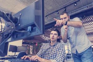 startup business people group working as team to find solution photo