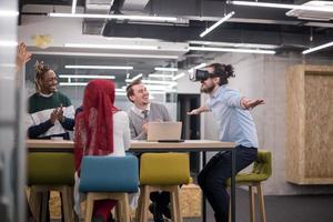 Young Multiethnic Business team using virtual reality headset photo