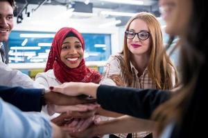 multiethnic Group of young business people celebrating success photo