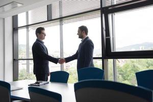 cloasing the deal in modern office interior photo