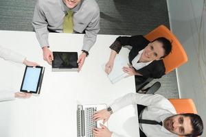 aerial view of business people group brainstorming on meeting photo