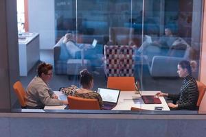 startup Businesswomen Working With laptop in creative office photo