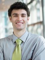 portrait of young business man at modern office photo