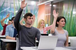 students group raise hands up photo