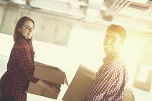 business team carrying cardboard boxes photo