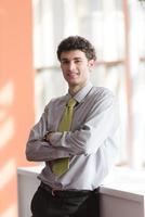 portrait of young business man at office photo