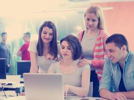 group of students study together in classroom photo