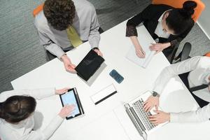 aerial view of business people group brainstorming on meeting photo