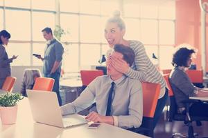 Two Business People Working With laptop in office photo