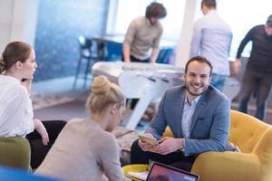 Startup Business Team At A Meeting at modern office building photo