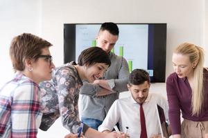 young business people group on meeting at modern office photo