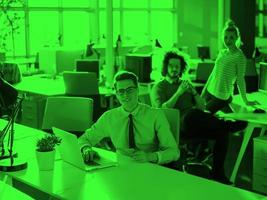 businessman working using a laptop in startup office photo