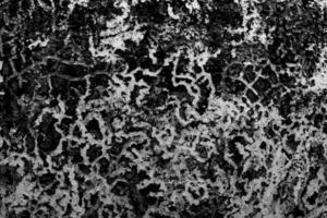 Black cracked concrete texture background. photo
