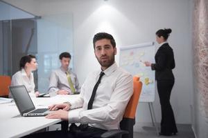 young business man at meeting photo