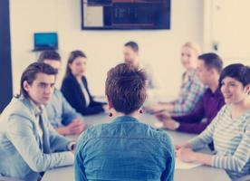 Business Team At A Meeting at modern office building photo