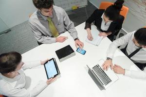 aerial view of business people group brainstorming on meeting photo