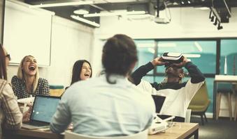 Young Multiethnic Business team using virtual reality headset photo