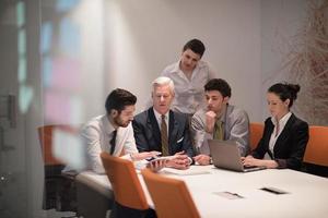 business people group on meeting at modern startup office photo