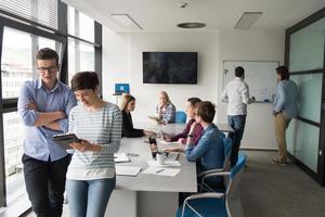 business People Working With Tablet in office photo