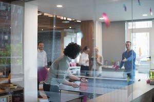 startup business team playing ping pong tennis photo